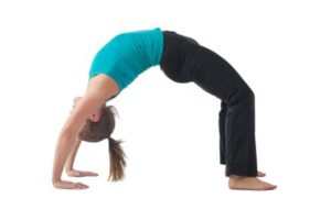 a_woman_in_yoga_bridge_pose